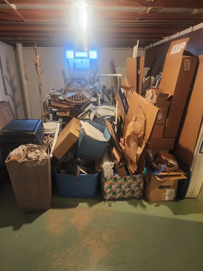 Roll-off dumpster container at job site for 2 Yard Dumpster Rental in Hatfield